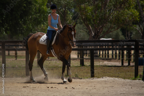 young woman showing her horse skills