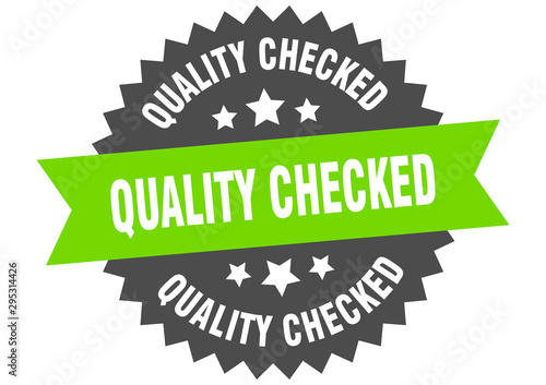 quality checked sign. quality checked green-black circular band label photo