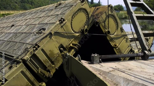 Military bridge with an internal compartment of the pontoon park