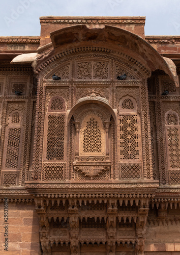 Decorated carved window in Mehrangarh fort, Rajasthan, Jodhpur, India photo