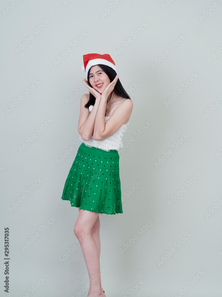 Cute young woman with santa hat Cute young woman with santa hat
