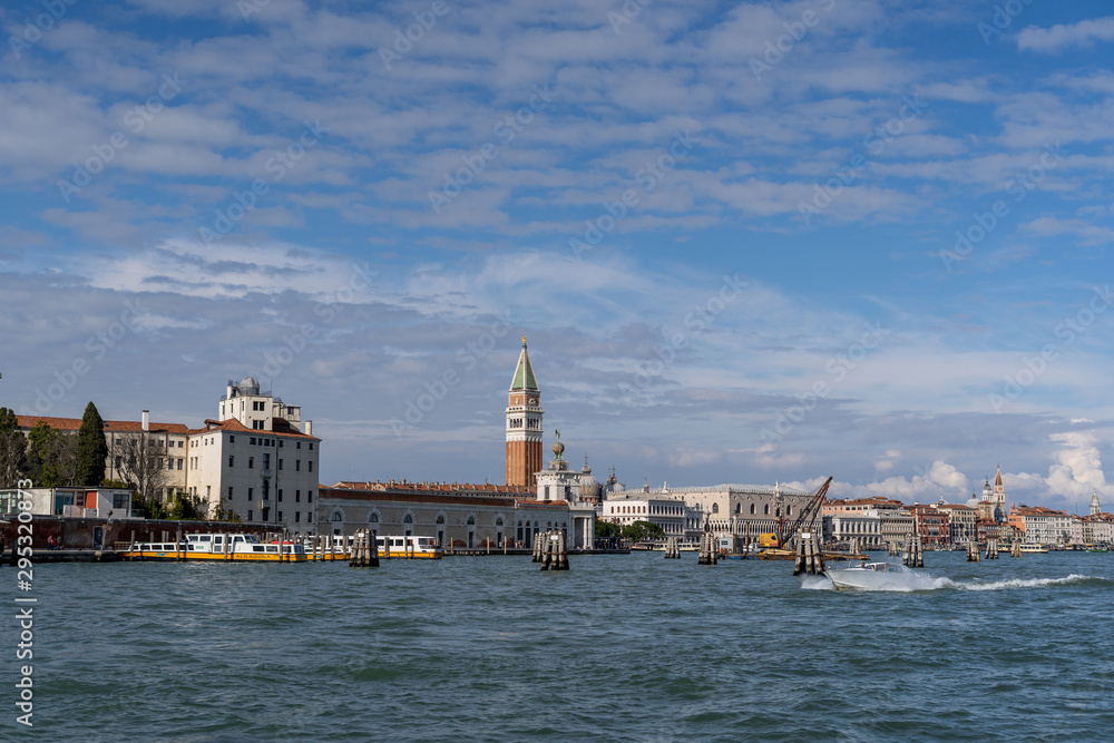 cityscape beautiful ancient town. Venice, laguna view on Basilica di Santa Maria della Salute, Piazza San Marco with Campanile, Doge Palace, and Arsenale. Venice, Italy