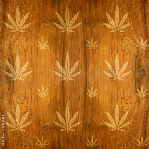 Marijuana cannabis leaf - decorative pattern - wood texture - seamless background