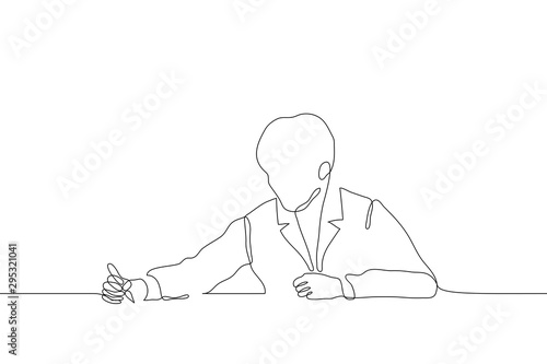 Continuous line art figure of a man in a jacket sitting at a table who is writing something. It can be used for animation. Vector illustration of a black contour on a white background.