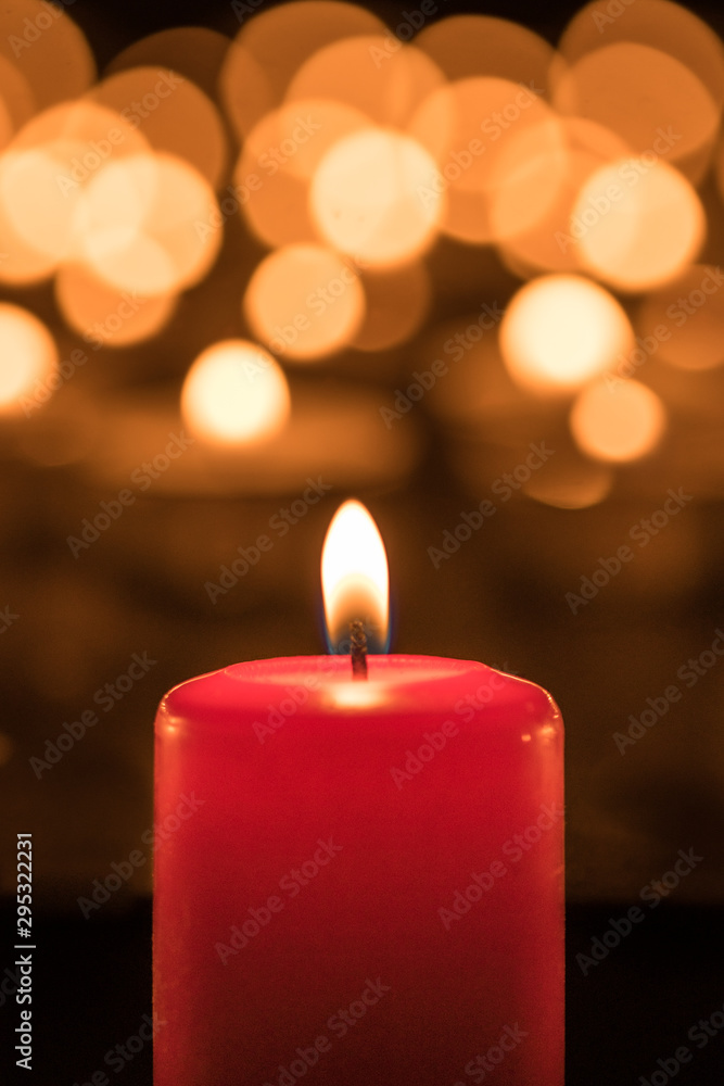 Glowing candle light during the first Sunday in Advent 