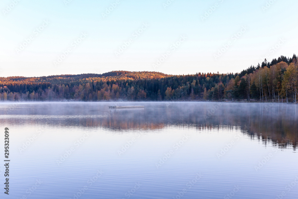 lake in fog in the morning