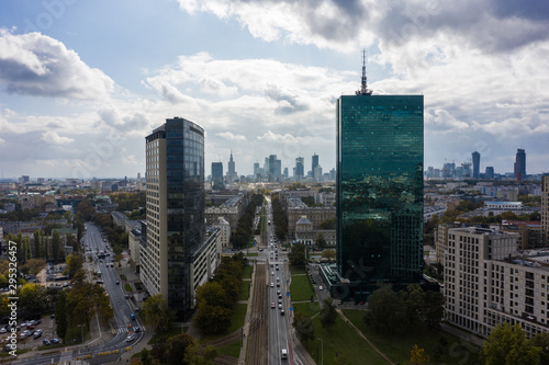 Aerial view of a cityscape with a view of skyscrapers and buildings in Warsaw. Poland. 06. October. 2019 Drone shot between two skyscrapers towards the city center.