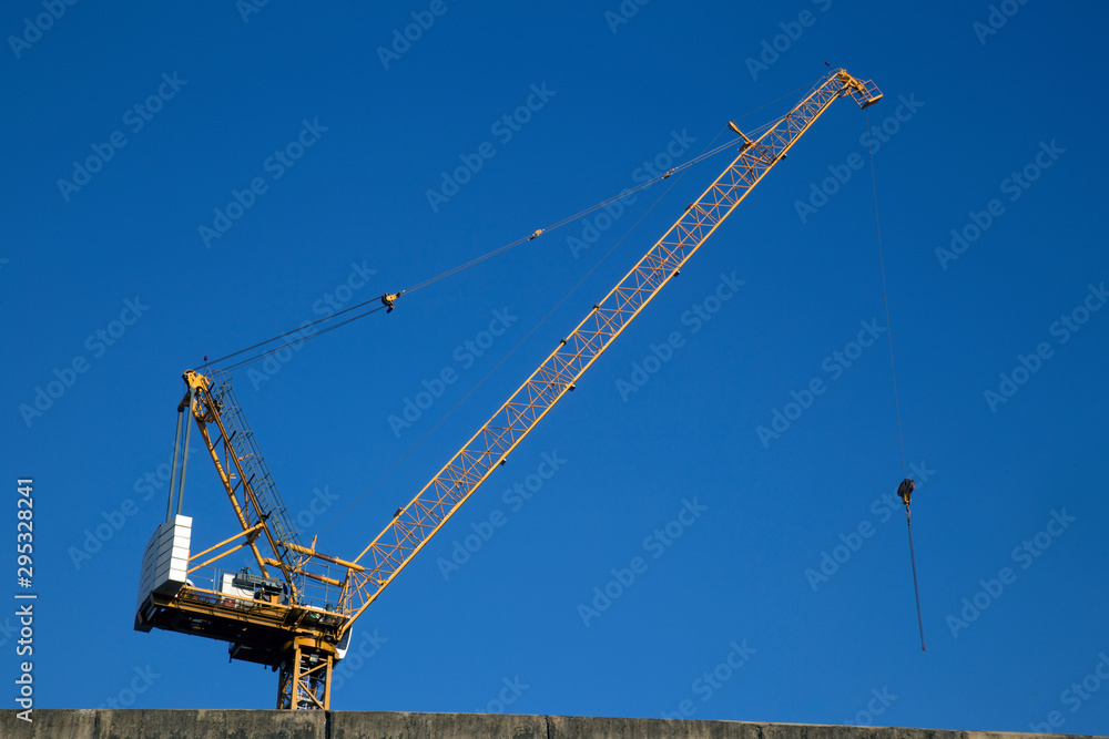Tower crane at the construction site Tower crane at the construction site