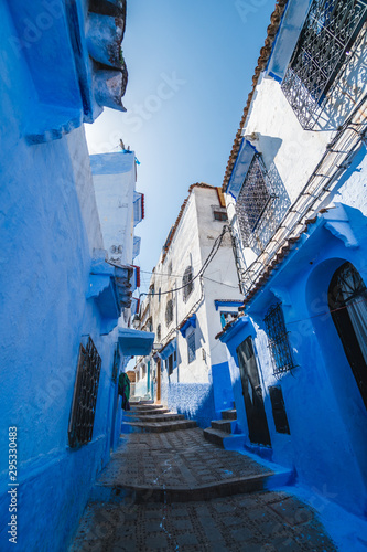 View of the narrow streets of the Chefchaouen city in Morocco, known as the blue city © icephotography