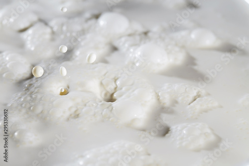 Milk DropMilk surface with splashes and bubbles.