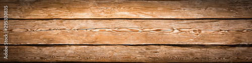 Brown wooden plank floor as panorama background with vignette