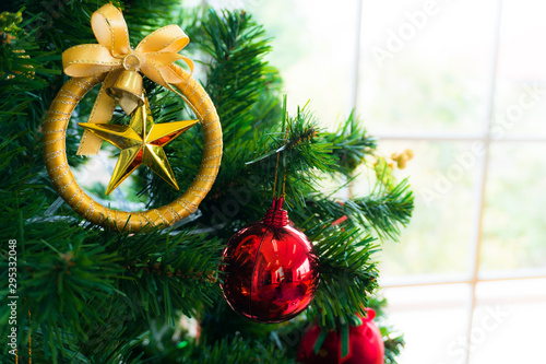 Christmas tree and Christmas decorations Placed in a room by the window