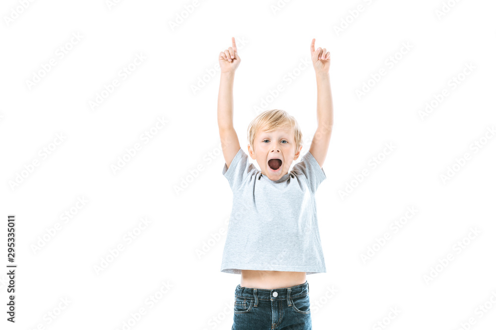 excited kid with opened mouth pointing with fingers isolated on white excited kid with opened mouth pointing with fingers isolated on white