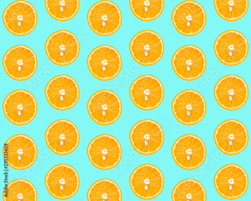 Creative pattern of orange on a bright blue background.