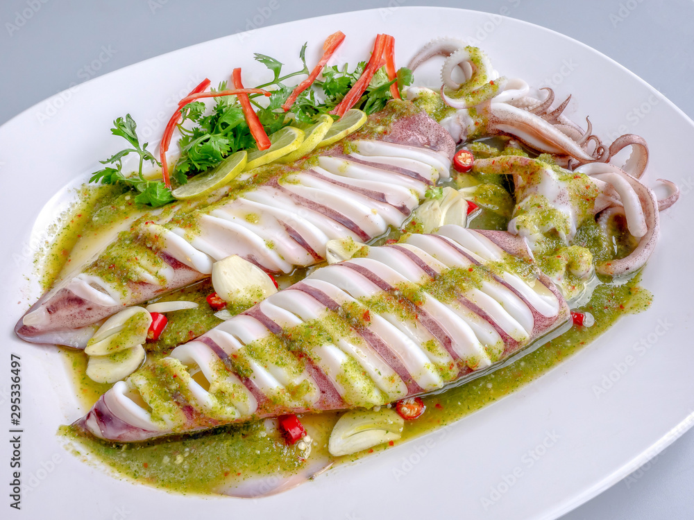 Squid steamed with lime,Thai food , hot and spicy Squid steamed with lime,Thai food , hot and spicy