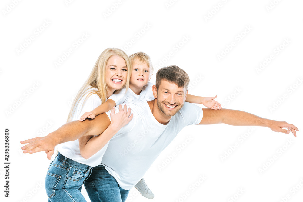 happy father and son with outstretched hands near attractive woman isolated on white