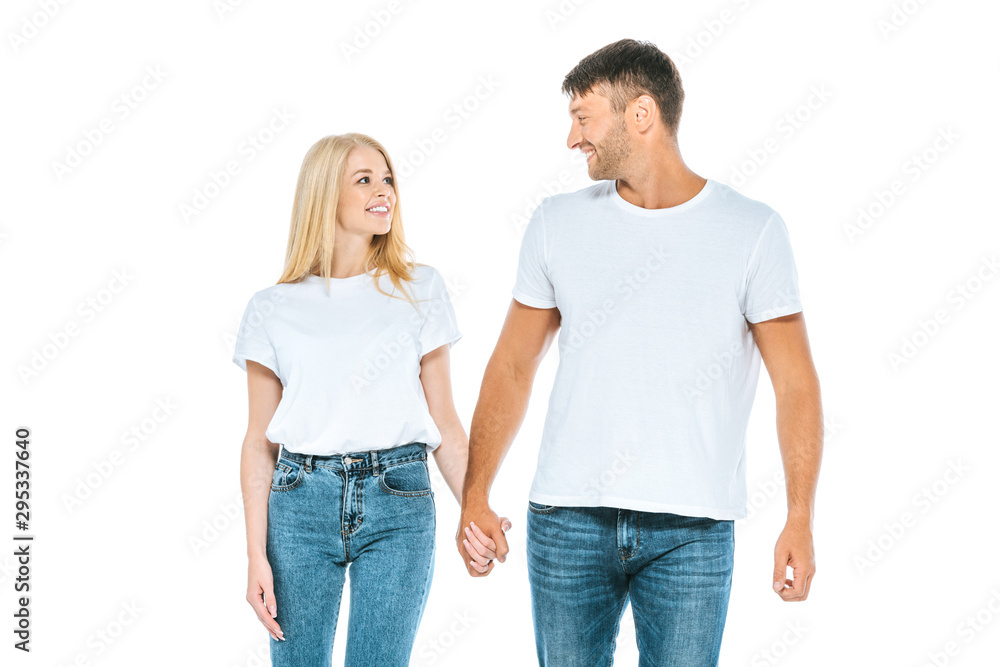 happy man holding hands with woman and smiling isolated on white happy man holding hands with woman and smiling isolated on white
