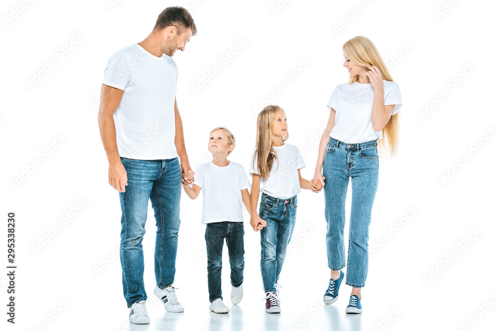 happy parents holding hands with cute kids on white happy parents holding hands with cute kids on white