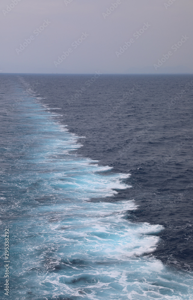 Wake of the cruise ship on the sea