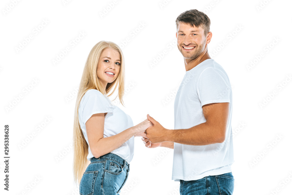 happy man holding hands with cheerful girl isolated on white happy man holding hands with cheerful girl isolated on white