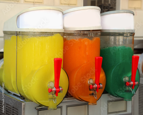 dispenser with many ice with syrup photo