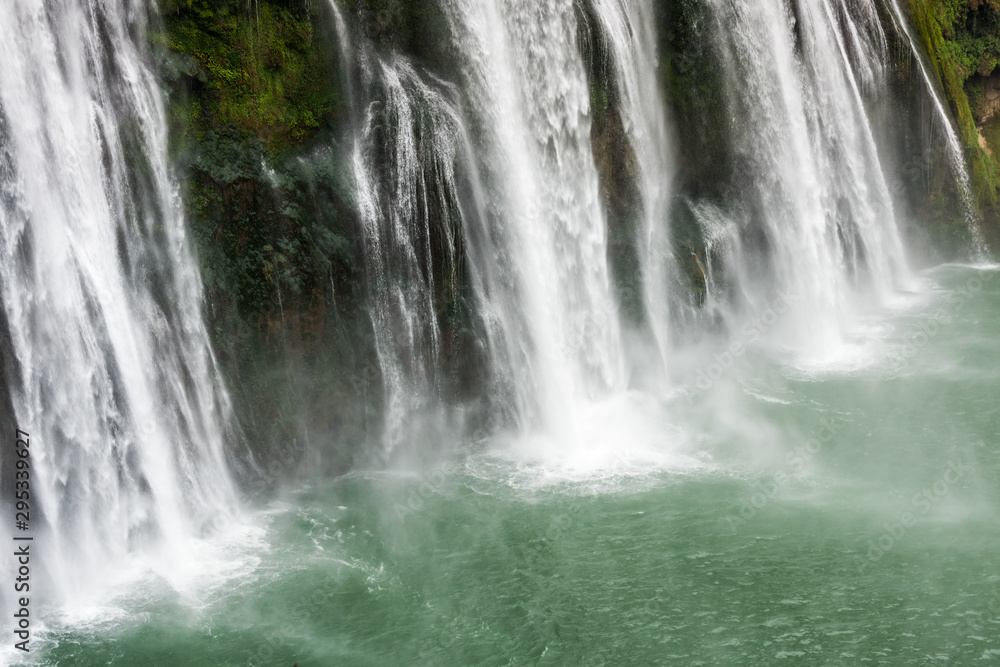 Huangguoshu Waterfall National Park in Guizhou Province in China, in winter season,the world's largest waterfall cluster. There are 18 of them in all. Huangguoshu Waterfall National Park in Guizhou Province in China, in winter season,the world's largest waterfall cluster. There are 18 of them in all.