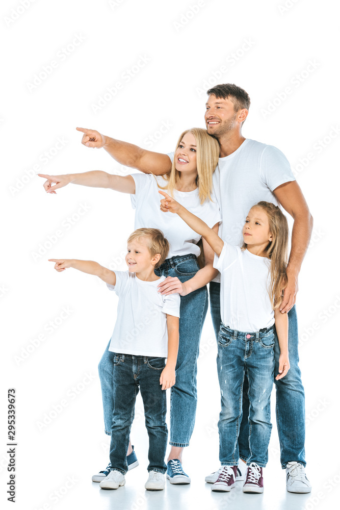happy parents and kids pointing with fingers and looking away on white happy parents and kids pointing with fingers and looking away on white