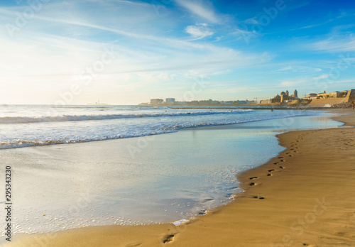 Wallpaper Mural Footprints in the sand on Santa Maria del Mar beach in Cadiz, Spain, Andalusia Torontodigital.ca