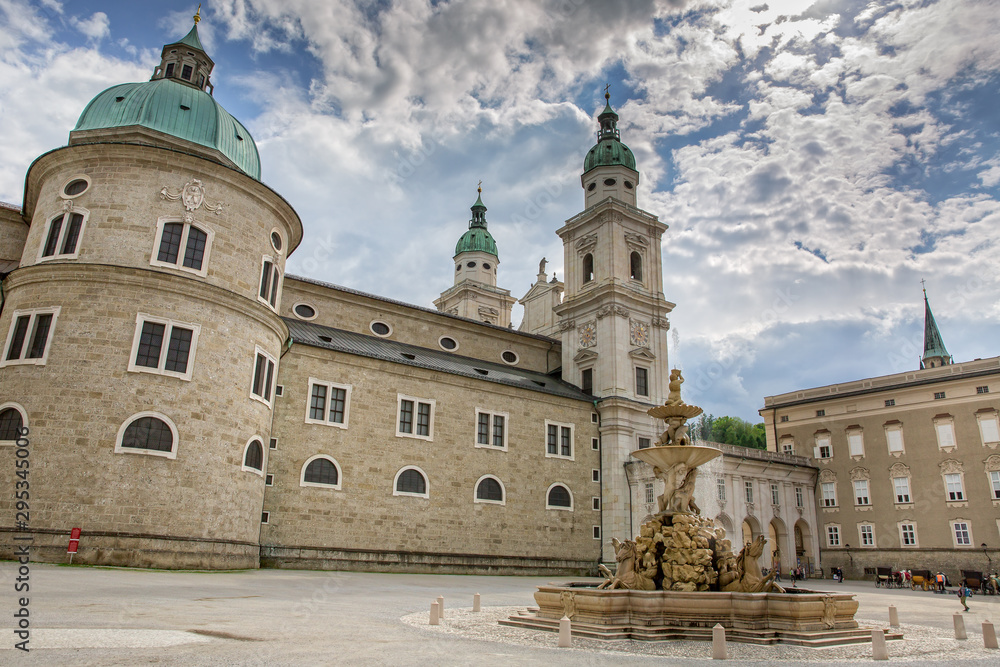 The Residenzplatz is located in the center of the old town of Salzburg. View of the Salzburg Dom and Residenz Fountain on the Residenzplatz in Salzburg, Austria
