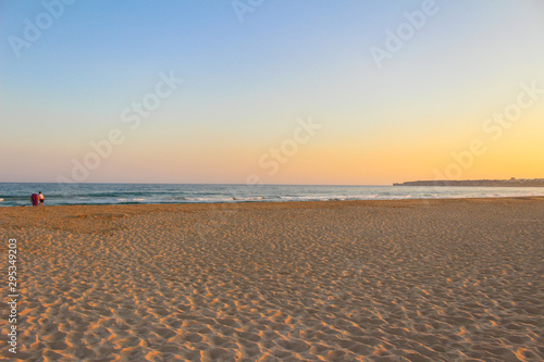 Sunset in Praia de Albandeira - beautiful coast of Algarve at sunset  Portugal