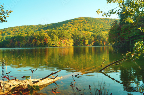 autumn landscape with lake and reflection in water