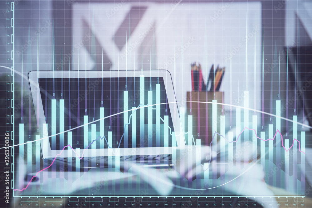 Forex market chart hologram and personal computer background. Double exposure. Concept of investment. Forex market chart hologram and personal computer background. Double exposure. Concept of investment.