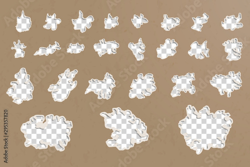 Bullet holes and gunshot traces on a carton background done with a birdshot ammo.