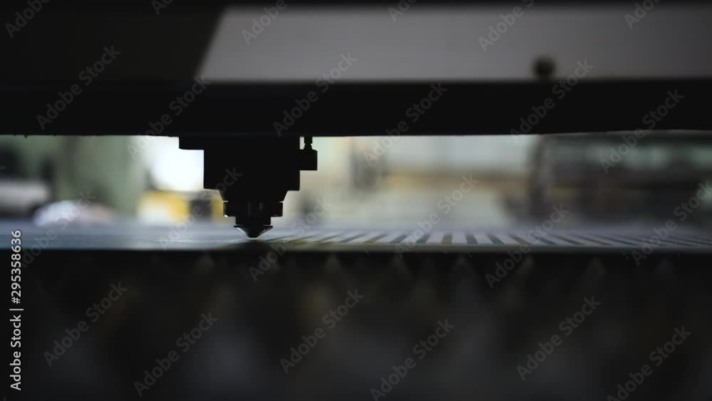 Machine for laser cutting of metal makes the cutting of a metal sheet. Machine for laser cutting of metal makes the cutting of a metal sheet.