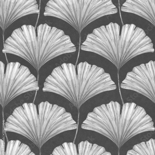 Leaves of Ginkgo Biloba on a dark gray background. Seamless pattern