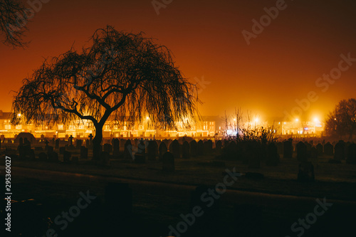 Toxteth Park Cemetery in the night, foggy night graveyard in Liverpool, UK photo