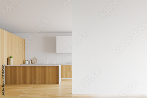 Fototapeta Naklejka Na Ścianę i Meble -  Wooden and white kitchen with mock up wall