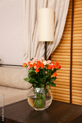 Wallpaper Mural Bouquet of flowers in a vase on a coffee table in the interior of the room Torontodigital.ca