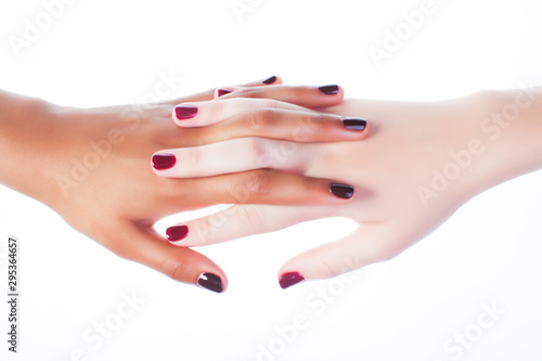 woman hands together manicured african tan and caucasian white isolated gesturing, lifestyle diverse people