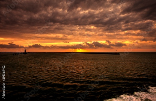 View of Dunkirk coast from the ferry to Dover at sunset.