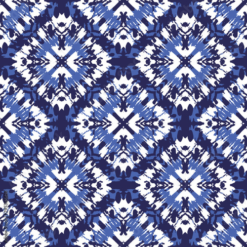 Tie-Dye Shibori Diamonds on Monochrome Indigo Background Vector Seamless Pattern