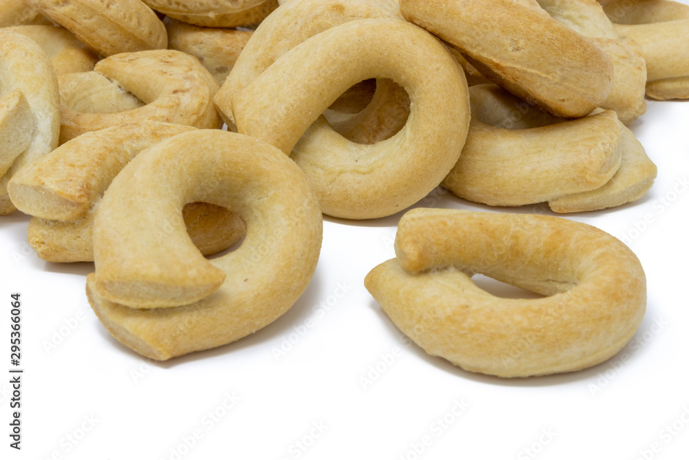 Italian taralli on a white background macro photography Italian taralli on a white background macro photography