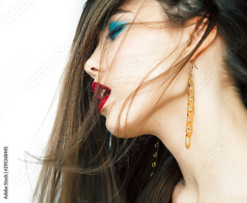 young pretty woman with bright fashion makeup hair on face, lifestyle people concept
