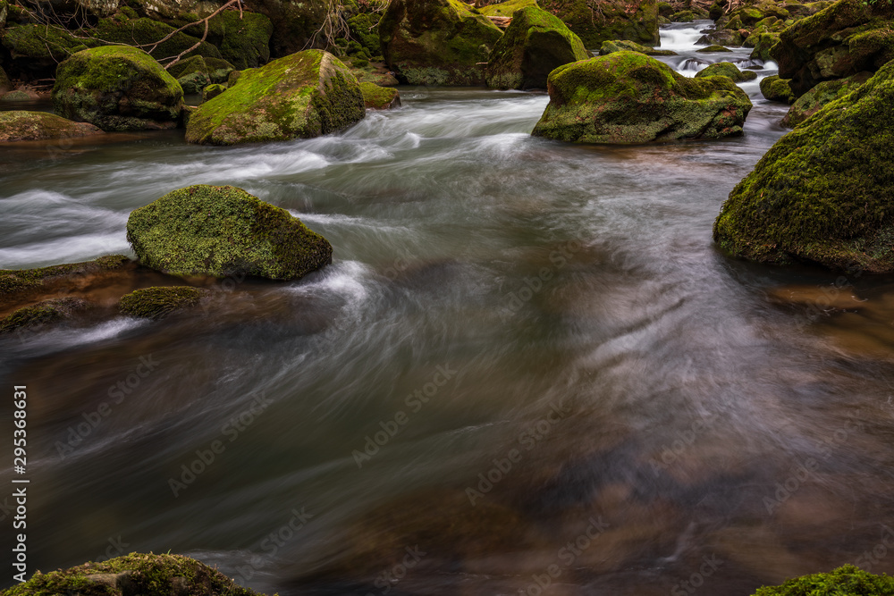 Waterfall in the forest in autumn, Irrel waterfalls Waterfall in the forest in autumn, Irrel waterfalls