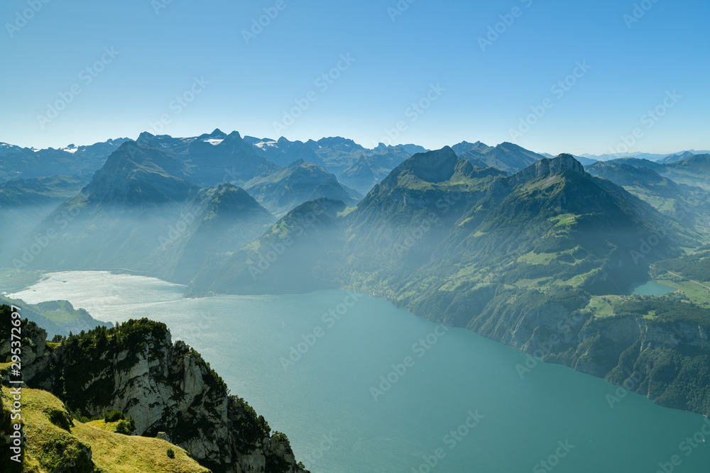 View on Swiss Alps and on Lake Lucerne from Fronalpstock peak above the village of Stoos