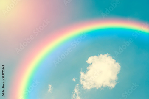 Retro blue sky and rainbows background