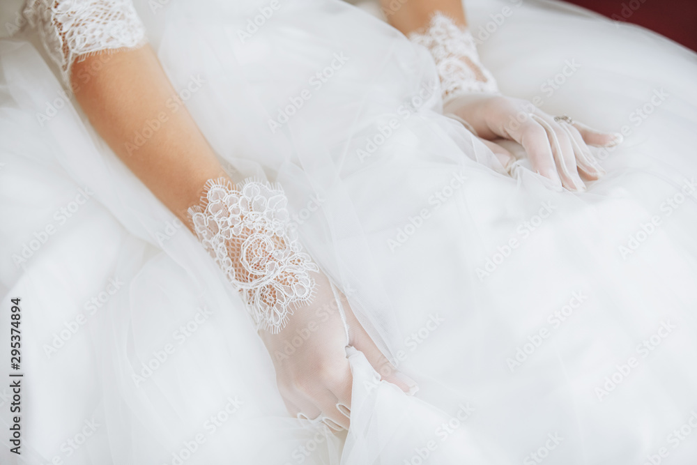 dress of the bride and hands closeup dress of the bride and hands closeup