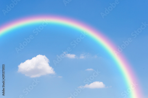 Blue sky and clouds with rainbow