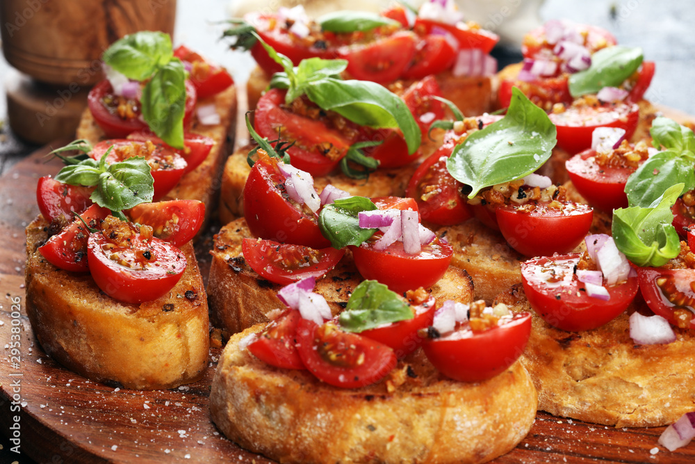 fresh tomato bruschetta. italian food appetizer with basil on table