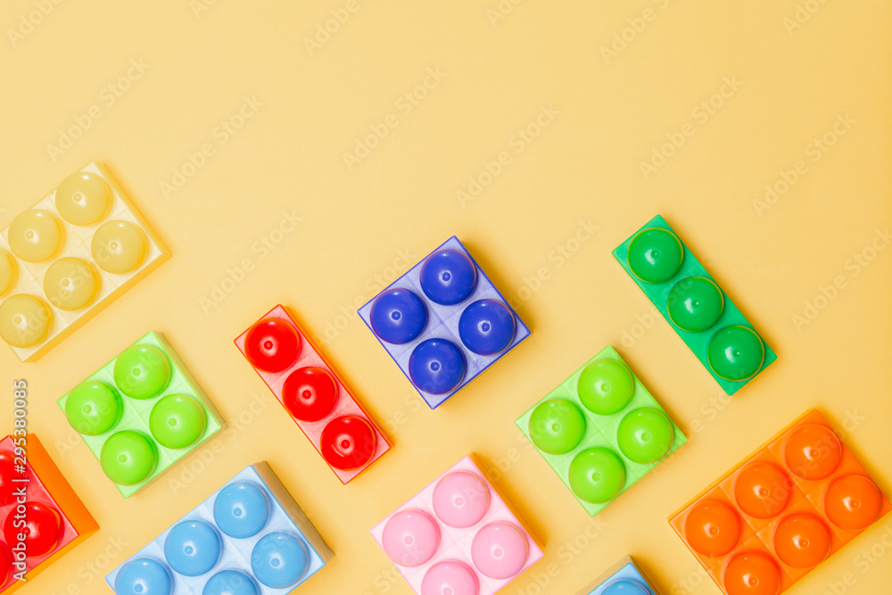 Toy blocks / Flat lay of multicolored toys blocks / Copy space for text Toy blocks / Flat lay of multicolored toys blocks / Copy space for text